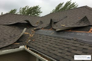 wind damage to roof shingles